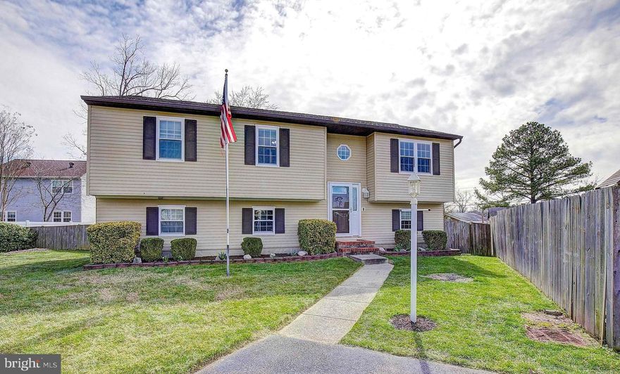 Immaculate Updated 4 Bedroom, 2.5  Bath Split Foyer Home tucked back off the Road.  Beautiful hardwood floors, Recently Remodeled throughout, Including New Roof in 2017 & New Pella Windows in 2019.  Amazing Kitchen with Gorgeous Granite Countertops, White Shaker top Cabinets and Wood Bottom Cabinets create a perfect contrast, Center Island, Stainless Steel appliances, Convenience of Double Wall Ovens, plus another Stove / Range for those large Holiday Gatherings. Breathtaking Wood Cathedral Ceilings are perfect accent in the Kitchen, Living Room & Dining Room.  Custom tiled Full Bathrooms Lower  Level with a Pellet Burning Stove and Half Bathroom that is large enough to easily make into a Full Bathroom, also offers plenty of Space for a Gym, Play Area, or an additional Family Room, 4th Bedroom or Office.  Large Utility Room / Laundry Room & Workshop.  Big Level Lot with Privacy Fenced Rear Yard great for Cookouts and Gatherings.  Perfect house with NO HOA.  Close to shopping and major commuter routes.  20 Minutes to Fort Meade, 30 Minutes to Annapolis & Baltimore.