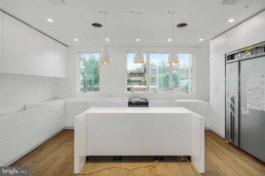 This May be your last opportunity to buy a new home in Rittenhouse with a FULL 10 year Tax Abatement. At the end of this year, the full 10 year Tax Abatement is going away  and is being replaced with a watered down version of the tax abatement. Enjoy luxury amenities at Moderna at Rittenhouse. Each home will have a Tax Abatement, 2-car garage, Elevator, and approximately 5002 square feet of living space and amazing luxuries throughout. Each home has a roof deck with skyline view and can have a plunge pool and outdoor kitchen. Moderna homes come equipped with Control-4 smart home systems included, 3-outdoor decks, chefs kitchen with Wolf/Sub-zero appliances package, quartz counters with 2cm eased edges, and custom cabinetry with soft close hinges. Moderna homes have a finished lower level with media room, wet bar and beverage center, custom closets throughout, multi zoned energy efficient HVAC system, and much much more. Located on one of the most desirable blocks in the neighborhood, convenient to the Lombard Swim club, Rittenhouse square park, and every wonderful amenity that makes Rittenhouse the most sought after neighborhood in Center City. New Construction town homes do not become available often in Rittenhouse! Moderna is located within the Albert M Greenfield School catchment. Some additional features include: 4 full bathrooms with custom tile work, frame-less glass showers, modern vanities with quartz counters, 3 half baths, Full size laundry room with whirlpool washer and dryer included and stainless steel laundry sink, wood clad windows throughout, solid core interior doors, interior metal railing system, upgraded extra thick drywall, upgraded energy efficient hot water heater, alarm system, sprinkler system, designer lighting and plumbing fixtures and a world class design. All square footage numbers are approximate and include above and below grade square footage. Square footage should be verified by the buyer. It is the responsibility of the buyer to verify real estate taxes.