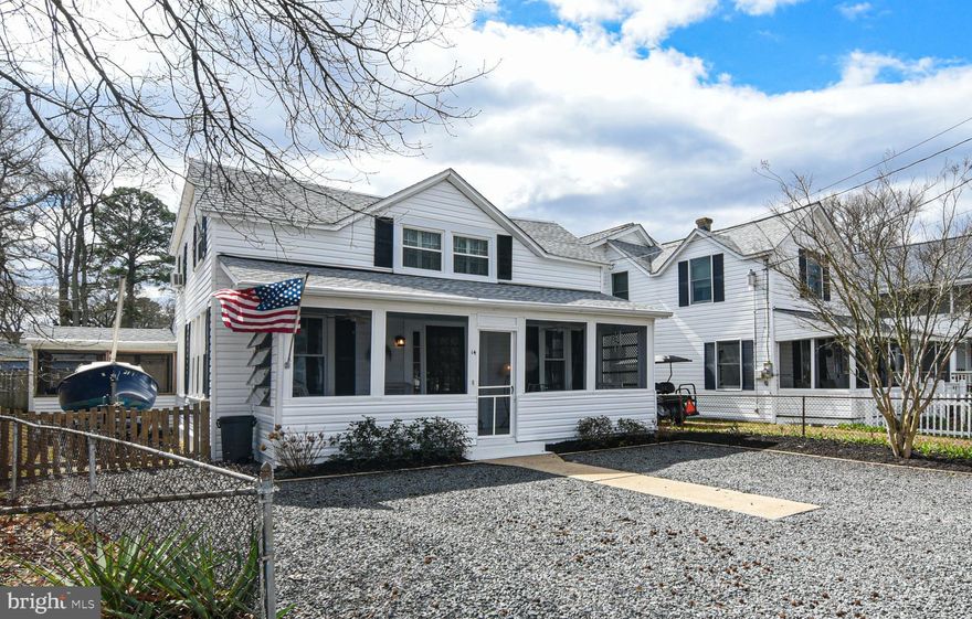 Potomac River Water View On The Point!  The screened front porch welcomes you to come sit awhile and enjoy the serene setting.  This classic 1940's beach home has been well maintained while keeping the original charm.  The interior design features a spacious living room, full bath, open kitchen/dining area with adjoining family room and screened side porch with water view.   All 3 bedrooms are upstairs with an adjoining full bath.  There's plenty of space to park your golf cart, water toys and more in the fenced backyard with large storage shed.  Offered move-in ready, turn-key with most of the furnishings.  AHS 1-Year Home Warranty included.  Being sold AS IS.