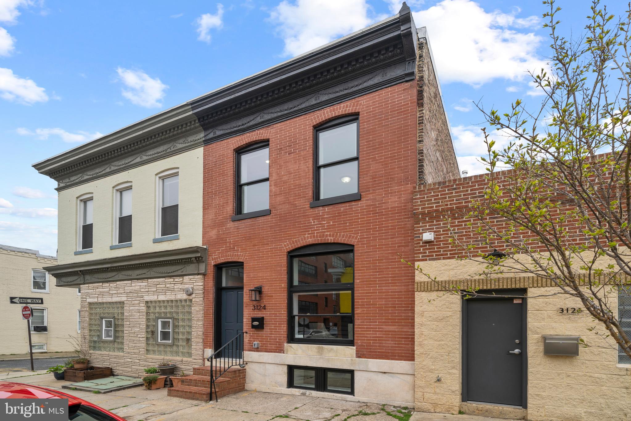 BRAND NEW 15+ FT WIDE RENOVATION with PARKING PAD, CHAP CREDIT PENDING. Completely renovated 4 bedroom , 3 bath row home in paterson park. Open main level floor-plan with exposed brick that flows into a large 3-seat island perfect for entertainment. Stainless steel appliances including a smart/family hub refrigerator, quartz countertops and large windows for natural light. Large upstairs owner's suite with beautiful double vanity, hallway skylight and second bedroom with access to the double deck. Hight ceiling Basement with two additional rooms and full bathroom. Just Mins from Canton, Fells point, 895/95.