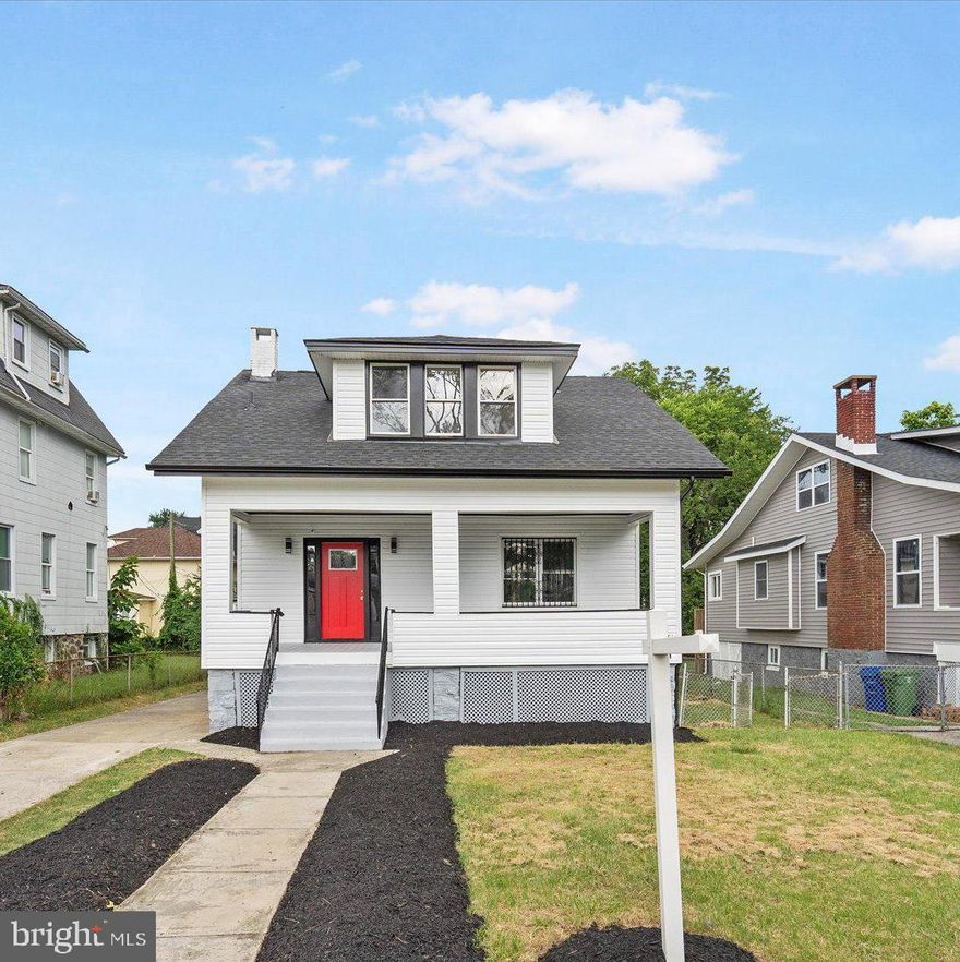 Welcome to this beautifully renovated single-family home, offering the perfect blend of modern luxury and everyday comfort. Featuring 5 spacious bedrooms and 4 full bathrooms—including a full bath on every level—this home provides exceptional flexibility for guests, multigenerational living, or a growing family.

Enjoy peaceful mornings or relaxing evenings on the charming front porch, an inviting space that sets the tone for the warmth inside. Step through the front door into an open, light-filled interior, where luxury vinyl plank flooring on the main and lower levels creates a stylish, cohesive feel.

At the heart of the home is a chef’s kitchen that truly shines—complete with quartz countertops, stainless steel appliances, a gas range, breakfast bar, and elegant pendant lighting. Whether you're preparing a casual meal or entertaining guests, this kitchen is designed to impress.

The primary suite serves as a private retreat, featuring a spa-like bathroom with a soaking tub, separate shower, and modern, high-end finishes. All bathrooms throughout the home have been thoughtfully updated with contemporary fixtures and stylish design.

Step outside to the back deck off the kitchen, perfect for hosting gatherings or enjoying al fresco dining. The extra-long driveway offers ample off-street parking for multiple vehicles—an uncommon convenience in many neighborhoods.

With top-to-bottom modern updates, this move-in-ready home combines style, function, and comfort in every detail. Don’t miss your chance to make this exceptional property your new home.