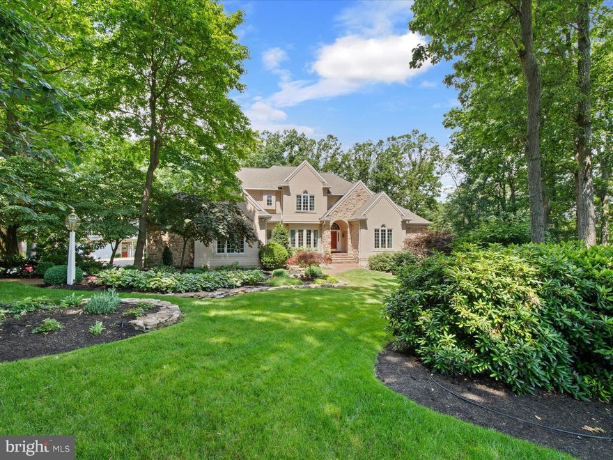 Welcome to this exceptionally tranquil location and retreat nestled in the woods of the Deer Chase Community. Spanning 5,200 square feet of living space, this home includes a main house with four bedrooms, four full baths and a half bath, along with a carriage house complete with an additional full bathroom, providing luxury and comfort throughout. This listing also includes an additional parcel in the sale. The interior of the home showcases cathedral ceilings, hardwood floors on the main level, crown molding throughout the house, and multiple fireplaces, complemented by exquisite finishing touches. The main floor boasts a formal dining room with wainscoting, a chef's dream kitchen with top-tier appliances, and a peaceful great room. Adding to the convenience is a first-floor primary suite. Elegance and functionality define this property, offering a harmonious blend of luxury and practicality in a coveted community setting. Upon entry, a grand chandelier and curved staircase with a niche welcome you. The chef's kitchen is equipped with a commercial six burner stove top, commercial hood vents, dishwasher, refrigerator with ice maker, center island with a prep sink, multiple garbage disposals, and a charming dining area overlooking nature. Adjacent is the family room, ideal for relaxation with its scenic views and access to the upper outdoor deck surrounded by lush trees.The primary suite is a personal sanctuary, offering a gas fireplace, french doors to the upper deck, coffered drop ceiling, and a luxurious bathroom with double sinks, jetted tub, water closet, a spacious walk-in shower, and an auto-lit walk-in closet. The formal living room features french doors to the deck and a gas fireplace. The upper level hosts three bedrooms, two bathrooms, one is a Jack and Jill, and one bedroom boasting a cedar-lined closet. The first lower level is perfect for entertainment, featuring a recreation room with a double-sided gas fireplace, built-in shelves, desk, a wet bar, back bar, ice maker, a garbage disposal system, and a full bathroom, as well as a game area. This lower level also includes a formal wine cellar with a center island, controlled temperature system, and custom wood shelving. In addition there is a spacious work out room on this level. There is an additional lower level with a room for bulk wine storage with its own controlled temperature system and extra storage space.This property features an oversized heated and cooled three-car garage and a full-house natural gas powered generator for reliable backup power. The carriage house is three levels and offers an oversized heated two-car garage, an upper-level office space with vaulted ceilings, wet bar, gas fireplace, a full bathroom, and a lower level for storage. Designed for entertaining, the main house includes two decks with nature views, speaker systems on two floor levels, and abundant space for guests. It seamlessly combines luxury living with natural surroundings, offering a retreat where you can enjoy both serenity and sophistication. Make this extraordinary home yours today.