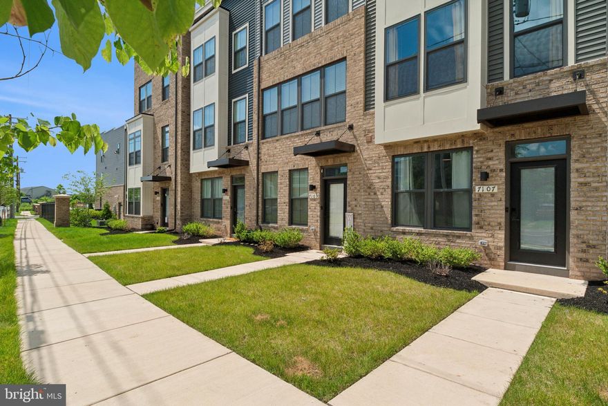 This modern, 3-bedroom, 3.5-bathroom townhome is luxury living redefined.  Lease signed by 01 DEC 2025 will pay 1/2 off the first 2 months ($1437.50 for 2 months).  Benefit from an incredible Smart Home & Utility Package INCLUDED in the rent (an estimated $150–$200/month savings). This value package features High-Speed Wi-Fi Service, a professionally monitored Security System (Doorbell & Floodlight Cameras), a Smart Keypad Deadbolt, and a Smart Garage Door Opener. The interior delivers unmatched comfort: each of the three spacious bedrooms includes its own private, full en-suite bathroom. The home is unfurnished and boasts high-end finishes, including gleaming hardwood floors, stainless steel appliances, luxurious granite counters, and an in-unit washer and dryer. You'll also enjoy your own private deck and an attached 1-car garage with a dedicated EV Charging Connection, in addition to overhead storage. Situated in a vibrant new community, the location is unbeatable—just minutes from Canton, Fells Point, CCBC, JHU Bayview Campus, and JHU School of Nursing, putting top dining and shopping right at your fingertips. Make this exceptional home your sanctuary today!