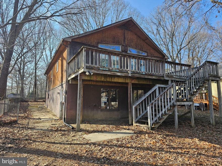 Raised rambler located in White Sands. Upper level has an open floor plan for the  living, dining area and kitchen. There are three bedrooms and 2 full baths on the main level with plenty of outside decking. Lower level is partially finished with plenty of storage areas and extra rooms. Home is located on a level lot.