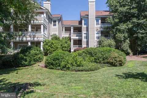 Photo of 14321 Climbing Rose Way #302, CENTREVILLE, VA 20121 (MLS # VAFX2347344)