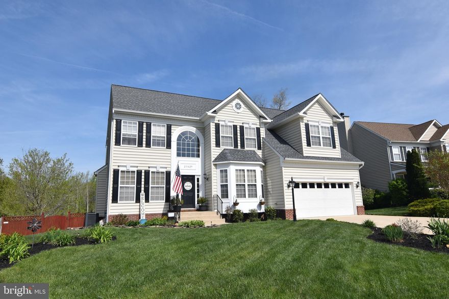 Beautifully maintained  & ready for new owners!!  Large open floor plan w/ great spaces for living & entertaining!  Main level has a library & a bedroom with a full bath.  Kitchen w/  plenty of cabinets, gas cook top & separate wall oven, granite counters , breakfast area  &  morning room with french doors to deck .  Family room has a Gorgeous stone gas fireplace.  Upper level has 4 bedrooms, 2 baths & large laundry room.  Master suite has a sitting  room & custom designed walk in closet.   Finished lower level has 6th bedroom, 4th bath,  wet bar, rec room, game room & gym.  Walk out to patio & beautiful back yard.  Central vac.  Lawn sprinkler.  Most appliances replaced within last two years.  Roof replaced in 2019.  Both HVAC replaced  2018 & 19.  Original owners!