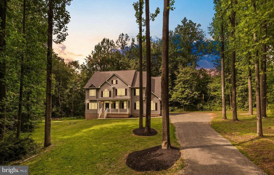 ***Extraordinary Custom Built Home (only 6 years old)  with a massive 3 car garage***4 Bedrooms, 3 full baths & 2 half baths-only 6 years old on a gorgeous 5 acre lot that is  partially cleared but surrounded by trees/woods and in an excellent location on the DC side of Warrenton***This home has so much to offer with custom finishes like  2 story foyer with oversized Palladium window, distressed 2 tone cabinets in the incredible Kitchen with premium granite counters, center island with tons of extra cabinet space, breakfast room with giant windows offering scenic views of the backyard & trees. Oversized 2 story family room with wall of windows, hand scraped teak hardwood flooring & the stone hearth & Artisan double door wood stove fireplace with hand hammered & wrought iron face-this special fireplace is able to heat the entire main level during chilly winter months! 2 half baths on the main level & a mudroom with custom ceramic tile flooring, oversized 3 car garage with extra storage areas & utility sink, Bedroom level offers 4 generous sized bedrooms with 3 full baths & a laundry room in the hallway with full size front loading washer & dryer.