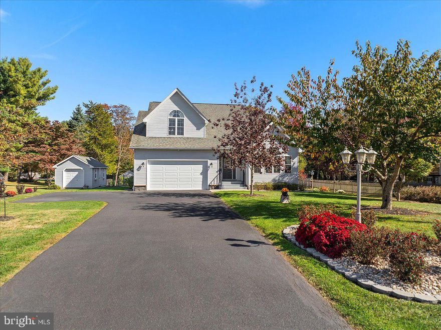 Welcome to Carroll Valley! Presenting a pristine, meticulously maintained, move-in ready home, with all recently updated appliances. Situated on a quiet cul-de-sac, this beautiful home welcomes you in through an inviting entrance. The gracious formal living room with cathedral ceilings, spacious, inviting dining room for gathering of family and friends adds to the ambience. Beautiful, fully equipped kitchen and the family room with an attractive fireplace create a warm, comfortable atmosphere. The first floor also features a  bedroom, a half bath and laundry room. On the upper level, a spacious primary bedroom with a sitting area with a bathroom, complete with a walk-in closet, shower and a whirlpool tub.  Additional closets make for great storage! Across the hall, two more bedrooms and the hall bath complete the floor. Huge basement with an attractive daylight door has great expansion potential. Many thoughtful amenities, and recent updates throughout. The property has a fenced,  level backyard, complemented by a Trex Elevation 20X20 deck and thoughtfully placed landscaping and a garden shed.  2 car beautifully kept garage.  Feel at home in this  community offering golfing and skiing by The Liberty Mountain Resort, plus an additional golf course. Inviting community parks with walking paths, creeks, lakes and children's sport and play areas. Local restaurants, hiking trails, orchards and the historical beautiful Gettysburg, all only minutes from the Maryland line, Emmitsburg and main routes for easier travel. Public sewer.