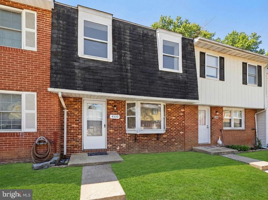 Freshly painted throughout and move in ready this cozy brick townhouse features LVP flooring on the first level and all new carpeting on the stairs and second floor.  New light fixtures including 4 light/ceiling fans with remotes for adjustable lighting in the living room and bedrooms, recessed lights, new door hardware and stair railing are a few of the upgrades.
Enter through the new front door to the light filled living room with a large bay window, closet and hallway with a storage closet under the stairs and a half bath with newer fixtures, washer/ dryer and extra storage. The spacious eat-in kitchen features newer appliances and new sliding doors out to the expansive patio finished with brick pavers and a privacy fence with a peaceful parklike setting beyond. The upper level features a spacious light filled main bedroom with double wall closets and windows overlooking the common area with trees and a brook. Two additional bedrooms with ample closets, hallway with linen closet and a full bath complete this floor.
Enjoy small town living close to parks, community and all the amenities and conveniences Marshall has to offer yet with quick access to points east for commuters.