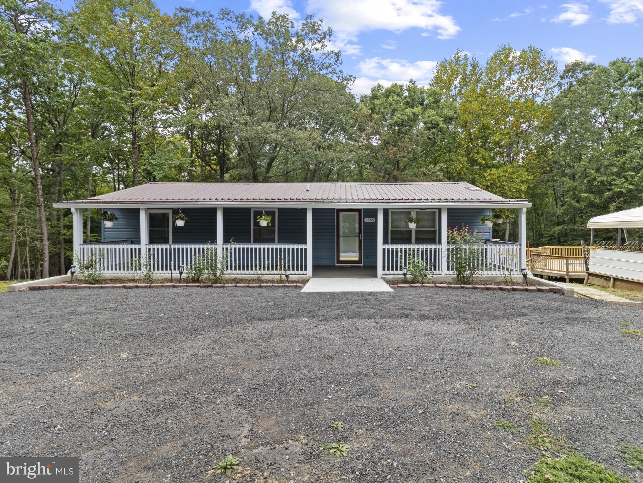 Welcome to this beautifully remodeled 3-bedroom, 2-bath Ranch-style home on 3.06 private acres in Nanjemoy. Bright and cozy, with laminate floors and an open-concept kitchen, this property offers the perfect retreat surrounded by nature. Step outside to a spacious deck with a removable pool (not in-ground), plus two carports, two storage sheds, and a large workshop. With a newer metal roof, no HOA, and plenty of space for hobbies or gardening, this home is move-in ready.
Enjoy nearby attractions such as Mallows Bay–Potomac River National Marine Sanctuary (kayaking, shipwrecks, fishing), Friendship Farm Park & Landing (hiking, boating), and Nanjemoy Creek. Convenient access to Rt 6 and Rt 301 connects you quickly to Waldorf, La Plata, and Washington DC.