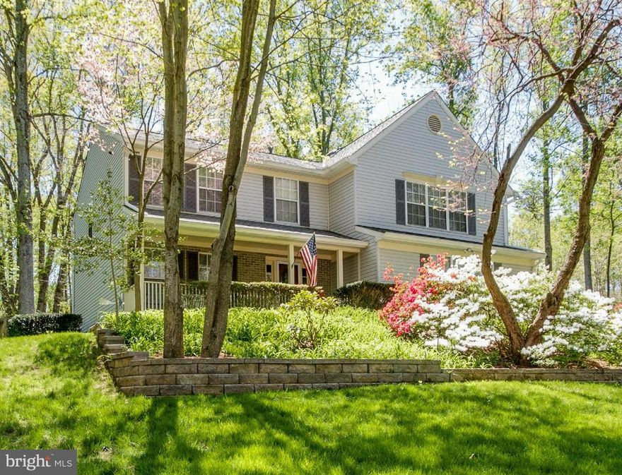 Spectacular home on majestic 1.6 acre lot w/no HOA. Beautifully maintained 4BR/3.5BH w/new SS appliances, granite, fireplace, front porch, finished basement, and lots of updates roof (2012), HVAC (2013), driveway (2014), water heater (2014), plus $5,000 credit for paint and flooring to make this your dream home. Meticulously maintained landscaping. Feeds to new high school opening in 2016