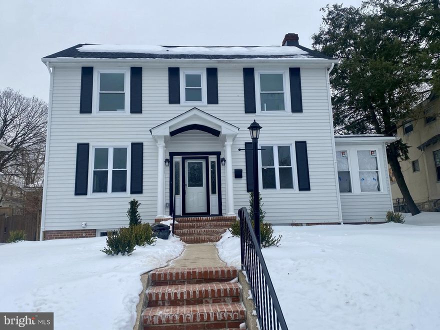 This beautifully restored Colonial blends classic Mayfield charm with thoughtful modern upgrades. Spacious, light-filled rooms and a redesigned kitchen create a comfortable, functional layout for everyday living and entertaining. The kitchen features granite countertops, crown molding detail, and all-new appliances.  The upper level includes a spacious primary bedroom with en-suite bath.  Improvements include new dual-zone HVAC, a new roof, new electrical wiring with 200-amp service, new plumbing, and a professionally waterproofed basement with dual sump pumps. The fully finished basement offers additional living space and abundant storage.  Located in the heart of Mayfield, this turnkey Colonial delivers timeless character with modern systems already in place. Conveniently located near Lake Montebello, Herring Run Park and Clifton Park Golf Course.