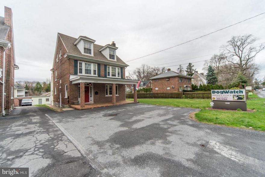 PRIME LOCATION ON HIGHLY VISIBLE COLUMBIA AVENUE. SITED ON A DOUBLE LOT WITH A PROFESSIONAL ALL BRICK OFFICE BUILDING WITH BEAUTIFULLY RENOVATED 2ND & 3RD FLOOR APARTMENTS GENERATING HIGH RENTALS PLUS THREE OUT BUILDINGS CONSISTING OF RENTED TWO CAR GARAGE WITH OFFICE AND AN SINGLE CAR RENTED GARAGE, ALONG WITH A SHED.  WELL MANAGED PARKING INCLUDING PARKING SPACES IN FRONT OF BUILDING AND 12 PARKING SPACES IN REAR...