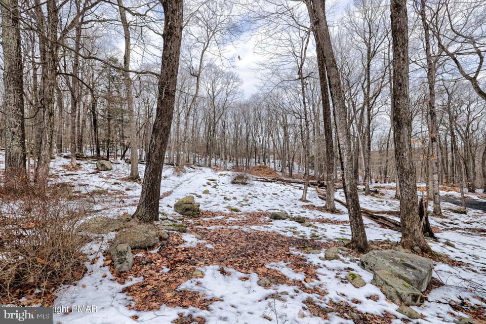 *** STREAMFRONT LOT *** Walk to the Lake Beach *** This property Already has a Foundation/Slab on it, What a Fabulous Location to Build Your Dream Home or Just Hold on to it and Build Later on... While still Making use of all the Amenities the Community has to Offer., Amenities Include - Outdoor Swimming, Outdoor Tennis Cts, Lake with Beach Area, Clubhouse. Come Check it out, Schedule your Private Viewing