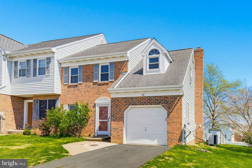 Welcome to this end-unit townhome in desirable Summit Hills! This home features three bedrooms and 2.5 bathrooms, offering both comfort and functionality.   Step inside to the inviting living room highlighted by a charming brick fireplace—perfect for cozy winter evenings. The adjacent bright sunroom fills the space with natural light, creating an ideal spot to relax.   The primary bedroom boasts vaulted ceilings, adding an airy feel. Outside, enjoy a composite deck overlooking a fully fenced backyard with low-maintenance white vinyl fencing—great for outdoor gatherings.  With its classic brick facade, attached one-car garage, and desirable end-unit location, this home combines style and convenience.  A wonderful opportunity you won’t want to miss!