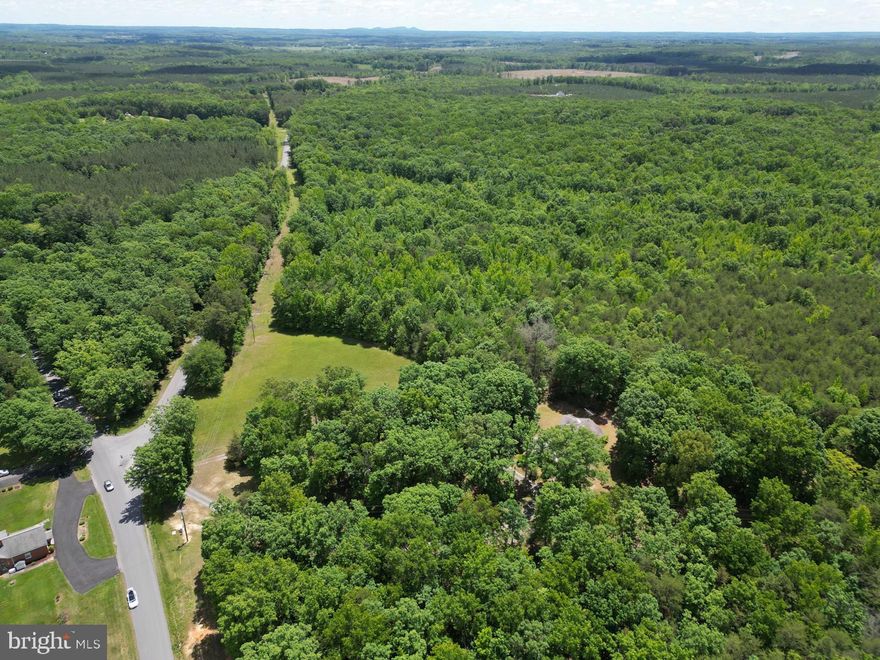 Don't let this opportunity slip away to build your dream home in Buckingham County. Experience the serene rural lifestyle while staying close to major cities. 20 wooded acres perfect for your new home, This could be the ideal location for multiple homes or your private oasis. The seller is open to subdividing the lot for smaller acreage. Conveniently located just 10 minutes from Yogaville, 45 minutes to Charlottesville, 25 minutes to Dillwyn, and less than an hour to Powhatan. Schedule your appointment today and make your dream home a reality!