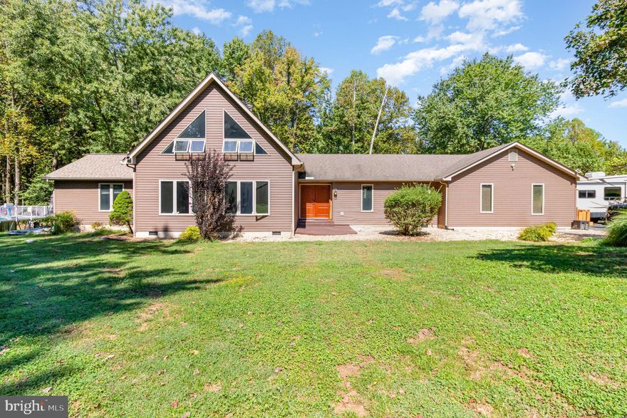 🏡 Private Retreat with Dual Primary Suites & 10+ Acres of Natural Beauty.

PRICE REDUCTION! MOTIVATED SELLERS - Discover one-level living at its finest with two spacious primary bedrooms, a cathedral-ceiling great room, and a bright, open floor plan that invites comfort and style. Step into the updated kitchen featuring Corian countertops, stainless steel appliances, a versatile kitchen stove that features a dual convection oven equipped with built-in air frying and dehydration capabilities—perfect for healthier cooking and preserving ingredients with ease, and a custom formal dining area complete with a built-in wine bar and gorgeous stone surround—perfect for entertaining.

Upstairs, a versatile loft space offers the ideal setting for a cozy family room, home office, or creative studio. The oversized 3-car attached garage provides ample space for vehicles, hobbies, and storage.

🌳 Nature Lover’s Paradise Set on over 10 beautifully wooded acres, this property offers privacy, tranquility, and breathtaking views of a serene pond. Enjoy the oversized patio, lush landscaping, fruit trees, and frequent visits from local wildlife. Explore riding trails with water access, all from the comfort of your own backyard.

📍 Prime Location Conveniently located just minutes from Dahlgren and only 30 minutes to Fredericksburg, this peaceful retreat offers the perfect blend of seclusion and accessibility.

✨ Whether you're seeking a forever home or a weekend escape, this property delivers the lifestyle you've been dreaming of.