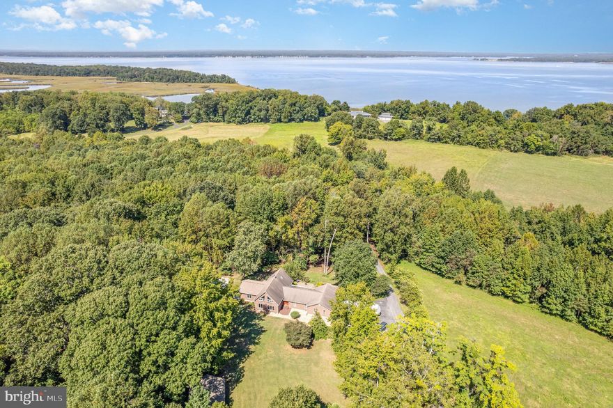 🏡 Private Retreat with Dual Primary Suites on 10+ Acres of Natural Beauty
PRICE ADJUSTMENT! Discover exceptional one-level living with two generous primary suites, a soaring cathedral-ceiling great room, and a bright, open layout designed for comfort and style. The updated kitchen features Corian countertops, stainless steel appliances, and a versatile stove with dual convection, built-in air frying, and dehydration functions—perfect for healthy cooking and meal prep. The custom dining area, complete with a built-in wine bar and stunning stone surround, sets the stage for effortless entertaining.
Upstairs, a flexible loft offers endless possibilities: a cozy family room, home office, hobby space, or creative studio. The oversized 3-car garage provides abundant space for vehicles, storage, and projects.
🌳 A Nature Lover’s Haven
Set on over 10 beautifully wooded acres, this serene property offers unmatched privacy and peaceful views of a tranquil pond. Enjoy the expansive patio, mature landscaping, fruit trees, frequent wildlife sightings, and access to riding trails with water access—all from your own backyard.
📍 Ideal Location
Located just minutes from Dahlgren and an easy 30-minute drive to Fredericksburg, this retreat strikes the perfect balance between secluded living and convenient access to nearby amenities.
✨ Whether you're dreaming of a full-time residence or a relaxing weekend escape, this property offers the lifestyle you’ve been waiting for.