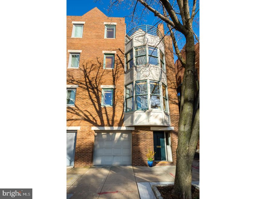 253 S. 25th Street at Manning. Park view multilevel architect designed townhouse in the heart of Fitler Square. Entrance: Vestibule leads to a light filled family room/office/den with a wall of glass leading to a mature tiered garden; side gate to Manning Street. Second Level: Main living level with a west facing bay window looks into Schuylkill Park. Living/Dining room with romantic wood burning fireplace, high ceilings and beautiful wood floors. The cook's kitchen is fully equipped: wall oven, 5 burner stove on an island, stainless steel double sink, Sub-Zero refrigerator, glass door upper cabinetry, abundant lower cabinetry. Breakfast room overlooking the garden with a door to the garden, and a back gate to Manning Street. Third Level: Spacious east and south facing bedroom, hall tiled bath with tub, west bay window and south facing bedroom, storage, mechanicals, 2 zoned Lennox HVAC (2018), laundry room. Fourth Level: Master floor with remarkable light; east, south, and west. Bedroom with 2 exposures, walk-in closet, 2 solid surface vanity, spa-like whirlpool tub and shower vaulted with skylights. Separate west facing library/office/sitting room with an incredible sunset deck looking into the park with some river views. The owner designed the home for his family. The design is very 21st Century urban at its best. Schuylkill River Park was his vision. This house represents a sensitivity to how to live with nature along with the railroad and the highway that connects us all. We live in an ever evolving environment. Enjoy this home for what it contributes. Excluded: stain glass panel and Mercury statue on the 4th floor deck.