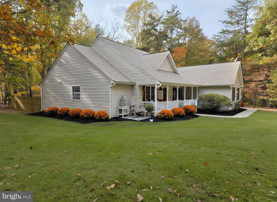 Nestled in the serene and highly sought-after Paynes Farm community, this custom-built single-story traditional home offers a perfect blend of comfort and style. With 3 spacious bedrooms and 2 full bathrooms (both handicap accessible), this residence spans approximately 2300sf, providing ample space for relaxation and entertaining. Rest assured, you will always have power with a **Generac automatic switching generator at your fingertips.** Step inside to discover a warm, inviting interior with elegant crown moldings, chair railings, and large rooms. The heart of the home is the country-style kitchen, equipped with stainless steel appliances, a breakfast area/bar, an abundance of cabinets and counter space, access to the back deck, a small fenced-in area for your pet(s), and a convenient layout that flows seamlessly into the fireside family room. Separate Dining Room and Office/Den, along with a real foyer, complement the entertaining spaces. A split bedroom plan offering privacy for each person, walk-in closets in each bedroom, and a guest bathroom with a walk-in jacuzzi tub. The primary bedroom, at the back of the home, is a warm, freshly painted room with a primary bath featuring a large dual-sink vanity with storage, a soaking tub, a glass-enclosed shower with a seat, individual sprayers, and a large walk-in closet. The exterior boasts extensive hardscaping and a welcoming front porch with a gate. **Crawl space is encapsulated and has HVAC vents to keep it cooled/warmed year-round** Situated on a generous 4.09-acre corner lot, the property is partly wooded, offering a sense of privacy and tranquility while backing to lush trees. Need more storage?  What about enclosing the garage for more interior room, adding a detached garage, or building an exterior shed(s), or extending the backyard fence to include more of the acreage? The well-maintained landscaping enhances the home's curb appeal, while the attached side-entry double garage, extra parking spaces, and ample driveway provide convenience for parking. Located on a no-thru street, this home offers a peaceful retreat while remaining close to local amenities. Experience the perfect blend of comfort, style, and nature in this delightful residence. Rest assured, you will always have power with a "Generac automatic switching generator at your fingertips". *Some of the photos are "virtually staged/enhanced" to give you an idea of how to decorate, what the yard and exterior would look like landscaped, and in the spring/summer, and if you replaced the flooring. Paynes Farm neighborhood is oh-so-convenient to Locust Grove, shopping and dining, within minutes of downtown Orange and the Spotsylvania area, and the many attractions, including Wilderness Run Vineyards/1781 Brewing Co, are so close. HOA is $220.00/yr and handles snow removal on the streets and beautification of public areas, but gives you the freedom on your own property.  (Don't like the carpet? potentially can make an offer with a flooring allowance) Offering 1-yr HSA Home Warranty included in the sale.