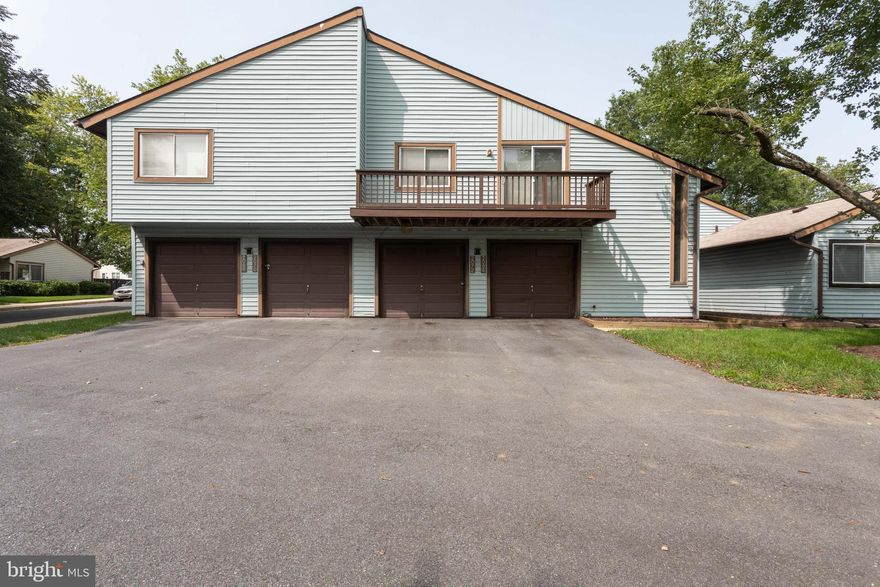 Cozy one level living in a quiet community!  Condo has 2 bedrooms/1 bathroom.  This condo has a large living area with an updated bathroom.  Fenced in yard that backs to common area.  Once car garage that can be used for a vehicle or storage.  Great location near the library, shops, and restaurants!