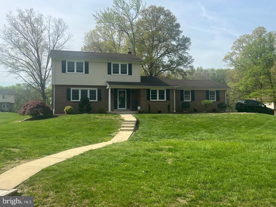 Here's a nicely updated and meticulous colonial with over a half acre lot in beautiful Hickory Woods!  This well built R.C. Peoples home features hardwood floors throughout most of the home, spacious living room, family room, and a dining room that is open to the renovated kitchen & Florida room.  The center island kitchen features warm cabinetry, granite countertops with tiled backsplash, newer stainless steel appliances, & wood look tile floors.  There is a picture window peering into the fabulous 28 x 14 Florida room with vaulted ceilings, tiled floor, lots of windows, and a slider to the patio.  A new powder room and laundry closet complete the main level.  On the the upper level there are three generous sized bedrooms featuring hardwood floors, new master bath and new hall bath.  There is also pull down stairs to access the attic for additional storage.  This home has a 2 car turned garage, fenced-in area, and an outdoor entertaining space featuring a pavered patio with wing wall & fire pit.  The clean basement is unfinished with built-in shelving for storage.  This home is a winner!