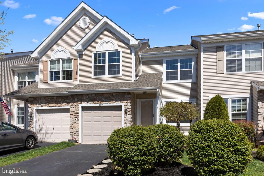 Welcome to 404 Mahogany Walk, nestled in the highly sought-after Ravens View section of Newtown Grant!  This beautifully rebuilt  3-bedroom, 2.5-bath townhome with a full basement is the definition of move-in ready. Reconstructed from the ground up to meet current building codes, it boasts modern finishes, quality craftsmanship, and stylish updates throughout.
From the moment you arrive, the covered entryway invites you into a bright and open living space, where the living and dining areas flow seamlessly together—perfect for everyday living and entertaining alike. Durable LVP flooring spans the entire first floor, offering both elegance and easy maintenance.
At the heart of the home is a sleek, newly renovated kitchen featuring stainless steel appliances (including a gas cooking range), a spacious island ideal for casual meals or meal prep, a pantry for extra storage, and a sunlit view into the cozy family room with a gas fireplace. Just off the family room, step out onto the raised deck and enjoy peaceful views of the tree-lined yard—your own private outdoor retreat.
Upstairs, the spacious owner’s suite offers a walk-in closet and a freshly updated ensuite bathroom with dual sinks and a modern shower. Two additional generously sized bedrooms share a full hall bath, and a convenient second-floor laundry room adds everyday practicality.
The full-sized unfinished basement offers endless possibilities—storage, home gym, playroom, or future finished living space—whatever fits your lifestyle.
This home has been thoughtfully upgraded for long-term peace of mind, including: new HVAC and electrical system; new siding and windows; new water heater; new flooring, new kitchen and baths, new stainless steel appliances, newer roof (2022).
As part of the vibrant Newtown Grant community, you'll enjoy access to walking and running trails, playgrounds, basketball and volleyball courts, and a sparkling community pool. Located in the award-winning Council Rock School District and just minutes from the charming shops and restaurants of Newtown Borough, this home offers both tranquility and convenience. With quick access to major highways and train stations, commuting is a breeze.
Don’t miss your opportunity to own this move-in-ready gem in the heart of Bucks County!