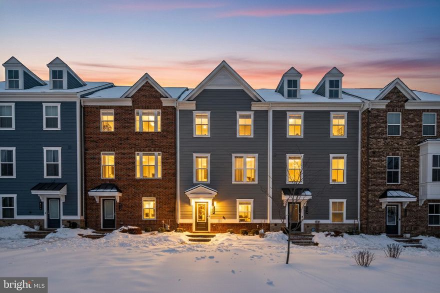 Welcome to this four-level Strauss Attic model by Ryan Homes which sits perfectly in Middle River and offers a layout that simply works for real life, paired with upgrades you can see and feel the moment you walk in.
The main level is bright, open, and elevated by an added fireplace, 12-foot ceilings, and hardwood flooring that carries throughout the home, including the stairs. The kitchen flows easily into the dining area and living space, making it ideal for everyday living or hosting. Just off the main area, step outside to the private deck for morning coffee or quiet evenings or if you’re going downstairs to the first floor is the 2 car garage and added first-floor office with matching LVP flooring, perfect for working from home without sacrificing living space. 
Upstairs, the owner’s suite feels like a true retreat with a walk-in closet and private bath. The additional bedrooms offer flexibility for guests or everyday needs. Hardwood floors continue throughout the upper levels, with carpet only in the bedrooms and hallway for comfort.
The top level loft, part of the sought-after Strauss Attic design adds exceptional versatility and includes a full bathroom and access to the upper balcony with views for miles. This space works beautifully as a second living area, guest suite, creative space, or private office.
Additional highlights include a full laundry room, 4 total bedrooms, 3.5 bathrooms, two accent walls (one in the primary bedroom and the other in the downstairs office), tankless water heater, whole-home sprinkler system, and all appliances conveying.
Well maintained, thoughtfully upgraded, and ideally located near Route 40, Route 43, and I-95 with shopping and dining within a stone's throw away, this home offers space, function, and comfort in one of Middle River’s most convenient locations and desirable neighborhoods. Ready for its next chapter.