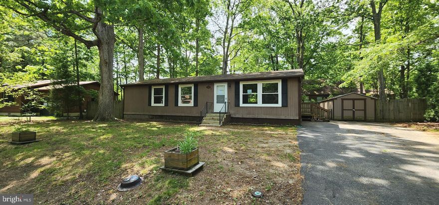 Rambler located on quiet side street with easy access to NAS Pax River. Enjoy one level living with plenty of  level yard space. This property may qualify for Seller Financing (Vendee). If Property was built prior to 1978, Lead Based Paint Potentially Exists. Sold AS IS.