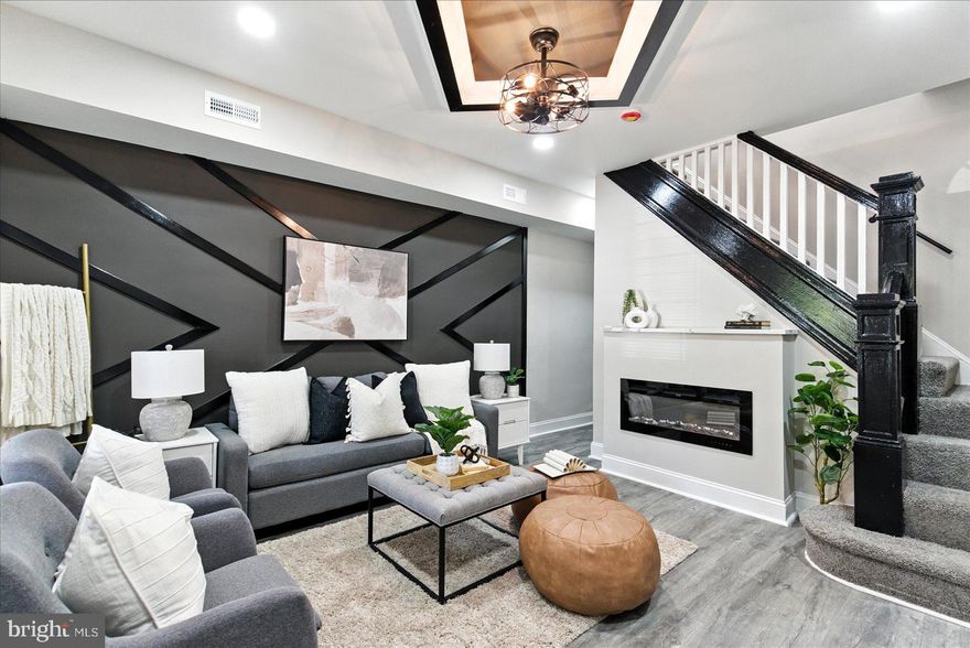 ***BACK ON THE MARKET  BUYER COULD NOT PERFOM*** A beautiful transformation has taken place behind the walls of this 3BR/1.5BA Townhome located on a quiet street in Coldstream Homestead Montebello.  Make your way through the gated front yard to the covered front porch of your new home.  Step inside a home filled with natural light, luxury flooring, new carpeting, recessed lighting, and a soft color palette with bold accents.  The main floor offers a spacious living room with a custom coffered ceiling and accent wall, and an electric fireplace feature.  Walk past a half bath into the open concept dining room and kitchen. The kitchen offers plenty of cabinets, sleek quartz countertops, stainless steel appliances including a beverage fridge in the large island with pendant lights, and breakfast seating. On the second floor are two sizable secondary bedrooms, a large primary bedroom with a gas fireplace feature, and a full bath with a skylight.  The lower level is finished offering additional living space including a possible fourth bedroom, a family room, laundry, storage, and a walk-out to Bilco doors in the yard.  From the kitchen step outside to a fenced yard filled with possibilities.  This home is move-in ready with so much to offer new homeowners and is located in close proximity to shopping, restaurants, and commuter routes.