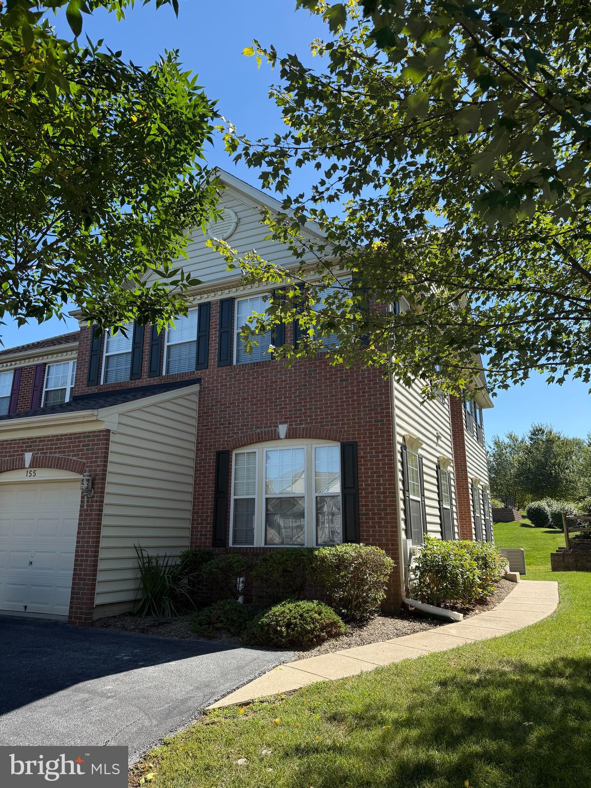 This is a stunning end-unit town home in the popular Penns Manor community of Kennett Square, PA. NEW CARPETING in the finished Basement, 2nd Floor Bedrooms, Hallway and Staircase along with some FRESH PAINT make this home feel new again. Natural light floods the inside from all the windows, all with 2” slat blinds for privacy at night. The location within the community is perfect, with plenty of green space out back and guest parking at the corner.