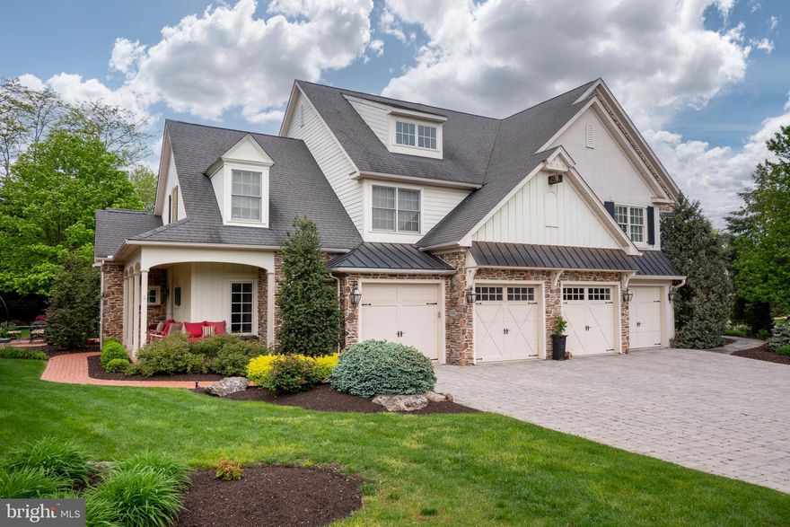 Imagine a lifestyle of streamlined elegance without sacrificing the luxurious comforts you cherish. Welcome to the prestigious STEVER MILLS. Nestled in a picturesque setting, this exquisite CARRIAGE HOUSE epitomizes charm and sophistication with stunning living spaces and captivating design features throughout. The exterior, adorned with a blend of stone and stucco, seamlessly marries classic and contemporary elements, while expansive windows flood the interior with natural light. Gleaming hardwood floors and intricate doorway trims with transoms create a seamless flow. A culinary haven awaits in the kitchen, complete with high-end appliances, custom cabinetry, and a walk-in pantry. Adjacent to the great room, a beautiful four-season sun room with brick flooring offers access to the private backyard patio. Enjoy the convenience of FIRST FLOOR LIVING in the luxurious primary suite, featuring a spacious bedroom and spa-like en suite bath. Upstairs, two additional bedrooms await, one with an en suite bathroom, providing ample space for guests or family members. Outside, LUSH LANDSCAPING surrounds the home, while two paver patios offer the PERFECT SETTING for alfresco dining and outdoor entertaining. The nearby Saucon Rail Trail and Lehigh's Stabler Fields offers plenty of opportunities for outdoor recreation. Charming coffee shops and a plethora of dining options are just minutes away from your convenient abode. Welcome to REFINED LIVING at its best.