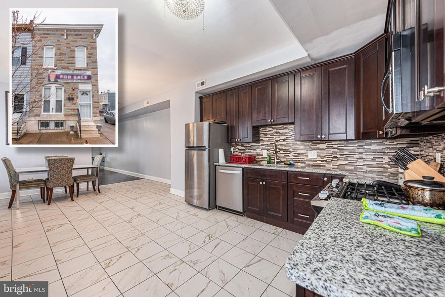 A FANTASTIC OPPORTUNITY AWAITS IN THIS END OF GROUP ROWHOME! The main level boasts a spacious living room that's perfect for relaxing evenings, an updated kitchen with ss appliances & granite counters that will inspire your inner chef along with a spacious dining area. Upstairs, you'll find three bedrooms and a full bath offering comfort and convenience. The finished basement with an exterior entrance features a sitting area, kitchen, bedroom, and a full bath providing a perfect space for guests or rental income to help pay your mortgage! Don't miss out on this incredible home!  Property is zoned as a single family residence.