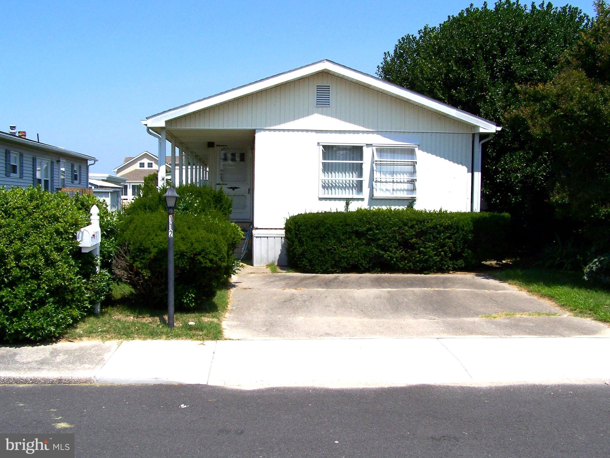 Location, Location, Location!! Prime building lot located in the highly sought after community of Montego Bay in North OC. Just a very short walk to the beach as well as shopping, dining, bus stop, and Ocean City's 58 acre Northside Park (home of the 4th of July fireworks). Come build your dream home on this great lot. Community amenities include 2 inground swimming pools, 1 kiddie pool, 2 tennis courts, pickle ball courts, shuffleboard court, 9 hole mini-golf course, 8 acre wildlife sanctuary/park area, a 5 acre pond with a blacktop walking/jogging trail, and a bayfront boardwalk with 3 fishing/crabbing piers...all for a low HOA fee of $385.00 a year!!
Only the lot is for sale!! Existing mobile home is currently leased until Sept.1st at which point the sellers have contracted to have the mobile home demolished/removed from the lot.