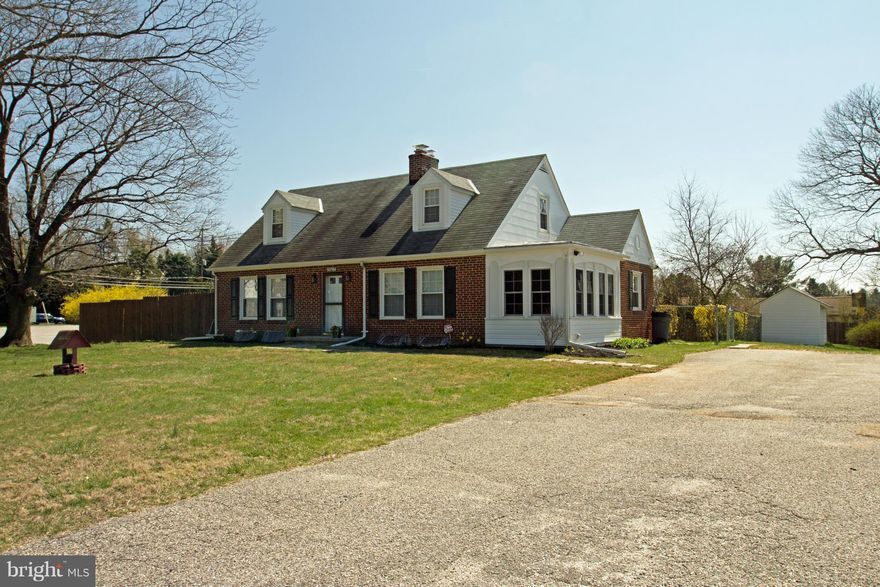 **ADORABLE All Brick Cape Cod, 4 bd 2full bath home with private driveway. Beautiful HDwood floors,lg room sizes.Bright and sunlit through out,1st flr. master,living room w/fire place.Lg basement w/ fireplace & work room/shop.Fenced in back yard.Easy commuter location to Balt.via I795 or across Worthington Valley. Natural Gas!!
