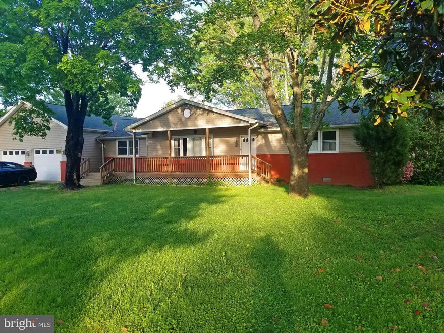 Charming Home in Water Access Community with Beautiful Beach. One Level Living with 4 Bedrms, 2.5 Bathrms. Bright, Open Floor Plan with Hardwood Floors. Covered Front Porch, Rear Deck and Two Car Garage. Tons of Storage, including a 20x24 Bonus Rm above Garage, Full Washer/Dryer. Move in and enjoy the beach this summer!