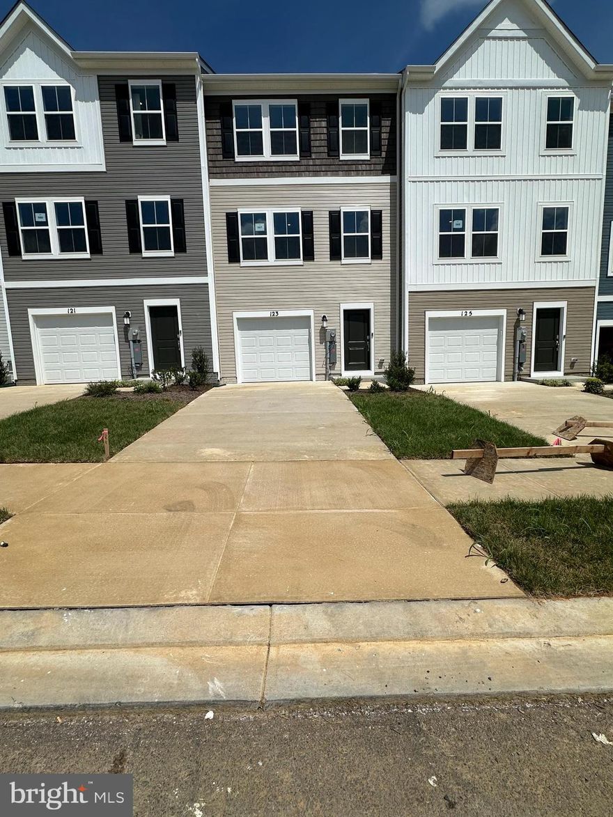 Welcome to The Gallery, one of Martinsburg's newest communities! 
This rental home is Newly built and you are the first person to move in. Located centrally to plenty of recreation, dining, and shopping options, and only 2 miles proximity to major metros like I-81, you'll have everything you need within minutes of your brand-new home! This 3-level townhome boasts a front-load 1-car garage, a spacious backyard, and 3 bedrooms. With 2 full baths and 1 half bath and an alternate third floor plan with a 2-foot extension, you'll have all the space and conveniences you desire. The pendant lights over the granite countertop island and Stainless steel appliances in the kitchen and wide surface flooring make this 1708 square foot home even more enjoyable!
Pets are allowed. The security deposit and first month are due when you sign the lease. May not last long at this Home for Rental in the Market, Call or schedule the tour