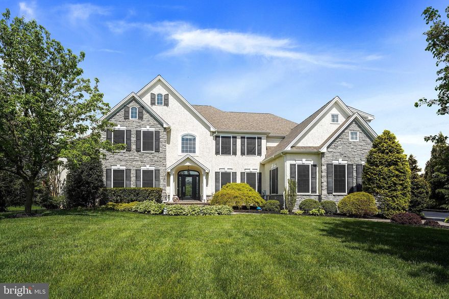 Discover unparalleled luxury in this exceptional executive home located in the highly acclaimed Garnet Valley School District. Situated at the end of a cul-de-sac on one of the largest lots  in the prestigious Greystone community, this 6 Bedroom, 4.5 Bathroom home offers over 7000 sq. ft. of living space and truly has it ALL...from the perfect, level, secluded lot, to the sun filled open floor plan with designer details and upgrades throughout. to the incredible outdoor oasis that is sure to please even the most discerning buyer. Enter from the EP Henry paver walkway that leads to a custom front door, welcoming you into an expansive  grand foyer adorned with gleaming cherry hardwood floors that flow throughout the Main Level. The formal Living and Dining Rooms exude sophistication, featuring wainscoting, 2 piece chair rail and crown molding. Open side hall leads to the Conservatory with 14 ft. ceilings, stunning palladium windows, and French door to covered side porch. Main floor Office with double six panel doors and two sets of corner windows offers an ideal workspace. Gourmet Kitchen with 42-inch cherry cabinetry, an oversized island (with seating for 4), a five-burner gas cooktop, and a large pantry. Adjacent to the Kitchen , the Family Room boasts vaulted ceilings, a wall of windows, and a wood burning fireplace with a marble surround.  The Morning Room. that is open to both the Kitchen and Family Rooms, is bathed in natural sunlight and has a triple window and slider that opens to the spectacular Back Yard Retreat. Step outside onto a raised and covered flagstone patio with a tray ceiling and metal roof (2018), complete with a built-in outdoor kitchen, perfect for al fresco dining and entertaining. The custom heated saltwater pool (40'x20') showcases triple waterfalls and an expansive paver surround, offering a private sanctuary overlooking open space and the original farmhouse and barn. A built-in firepit with seating enhances the outdoor entertainment options. The open front or back staircases lead to the Second Level that features a luxurious Master Suite with a sitting area, his-and-hers closets and a five-piece Master Bath with a jetted soaking tub, separate vanities, and an expanded fully tiled walk-in shower. Four additional generously sized Bedrooms, two full bathrooms (one Jack & Jill), and a convenient second-floor Laundry Room complete this level. The fully finished, walk-out Lower Level offers extensive additional living space, including a spacious Game Room, a two-tiered wet bar with double wine coolers, icemaker, refrigerated drawers, and tumbled stone flooring, Media Room (18x14), and Exercise Area. This level also hosts a sixth Bedroom featuring a double closet and an additional sitting area, accompanied by a full bath, ideal for guests or extended family. The extensive list of upgrades and amenities also include an oversized three-car Garage, (new) Pella doors throughout, (new) HVAC (2 high efficiency units-2020), updated outdoor lighting, and an irrigation system (to name a few).  The prime location of this home provides easy access to major highways, Philadelphia Airport, and Downtown Wilmington. Schedule your private appointment today to tour this remarkable property.