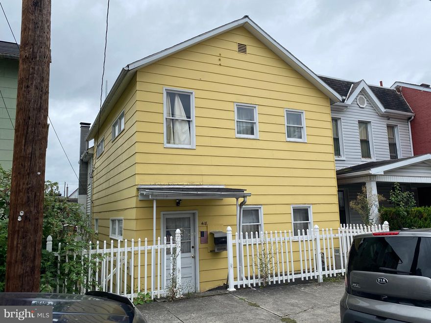 Check out this spacious 2-bedroom, 1-bath home, located in the heart of Cumberland, MD. This charming residence truly feels like home the moment you step inside. The inviting front entryway features a convenient coat closet, leading into a large, welcoming living room that seamlessly opens to the Formal Dining area.  From the dining room, you have options—head down to the basement, ascend upstairs, or continue into the bright eat-in kitchen. Enjoy outdoor entertaining on the covered back porch, which connects directly to the kitchen. Additional storage is available in the shed, or you can park your vehicle under the carport in the backyard.  Upstairs, you'll find a versatile loft space perfect for a computer desk and chair.  This room is complete with a cedar closet for extra storage. Adjacent to this space is a spacious storage room. The second bedroom and full bathroom round out the upper level, providing ample space for family or guests.  Located close to all amenities, this property offers both comfort and convenience. Don’t miss out—Call today to schedule a tour! This one won’t last long.