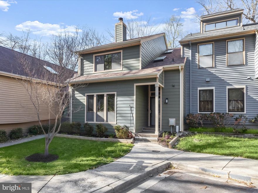 Welcome to this beautifully upgraded townhome in the highly desirable Woods Landing community, where thoughtful design and modern style meet everyday comfort. From the moment you arrive, the fresh Hardiplank siding with PVC trim, recently replaced roof, and composite deck with steps to the backyard set the tone for a home that’s been carefully enhanced inside and out.
A wood-look ceramic tile porch and brand-new front door with a transom window welcome you into the light-filled two-story foyer, where a skylight overhead hints at the unique architecture throughout. Skylights on the upper level allow light to spill through to the main level, creating a bright and uplifting atmosphere. Rich hardwood flooring flows throughout much of the home, paired with a serene interior paint palette applied just last year and updated door hardware for a cohesive, modern feel.
The living room offers warmth and character with a wood-burning, dual-sided fireplace wrapped in classic wood surround. The adjacent space, currently used as a sitting room, expands your options—ideal as a cozy lounge or formal dining area. The renovated kitchen is a standout with soft-close cabinetry featuring roll-out shelves and under-cabinet lighting, granite countertops, a tile backsplash, and stainless steel appliances. A breakfast bar and dining area offer flexibility for casual meals or entertaining, and a sliding glass door leads to the composite deck for easy indoor-outdoor flow.
A powder room and laundry room complete the main level, keeping functionality at your fingertips.
Upstairs, the spacious primary suite invites relaxation with a walk-in closet and a stunning en-suite bath boasting a quartz-topped double vanity with aqua veining and a floor-to-ceiling tiled shower with glass door. Two additional bedrooms share a stylishly renovated hall bath, complete with a modern vanity and tiled tub/shower surround.
The lower level adds valuable living space with a recreation room with a pellet stove and a sliding glass door that opens to the patio—perfect for movie nights or game days. A full bath and a sizable closet make this area versatile for guests or hobbies, while the utility room offers plenty of storage.
Residents of Woods Landing enjoy access to exceptional community amenities including boat storage, tennis courts, a dog park, walking paths, grass mowing, and seasonal leaf cleanup. Just minutes from Bay Head Park and the scenic Chesapeake Bay waterfront, this location also offers quick access to major highways including U.S. Routes 50/301, MD Route 2, and I-97. Enjoy nearby shopping and dining at Annapolis Harbor Center or downtown Annapolis, with its charming boutiques, historic streets, and waterfront views. A rare opportunity for refined living in a picturesque setting—this townhome is ready to welcome you home.