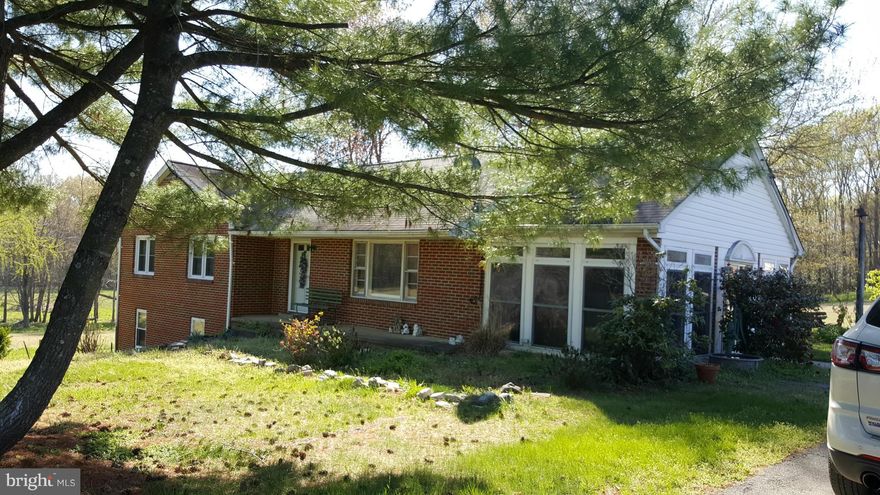 Awesome Property! 52+ acres.  2 ponds, flat cleared area, some wooded, House in Good Condition.  All Brick Rambler with Full Basement.  Enclosed sunroom, 3 Full Baths, 4 Bdrms, partially finished bsmt, walk-up attic space, hardwood floors main level, detached 2 car garage, Second Home at the Property for Sale also CH9660653 with 4 acres! Could work great for a second family + more