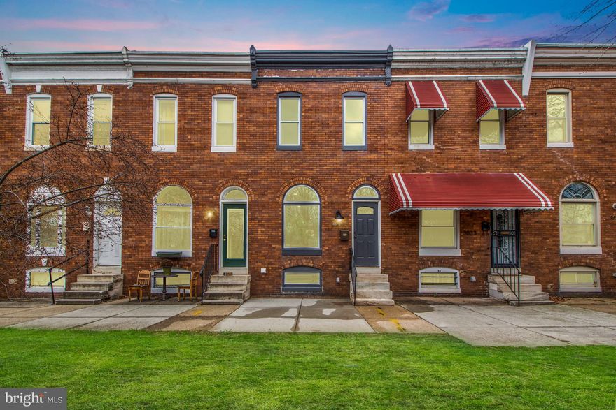 Offers due by 4/11 at noon. This location is so sought after, that a home has not sold on this block since 2017, and this rarely available Remington park front property has been fully renovated with new plumbing, electric, bathrooms, kitchen, windows, almost everything is NEW! Entering the property you’ll find a vestibule which pays homage to the original character of the home, as does the exposed brick wall and  refinished original hardwood floor. This wide home provides you plenty of room for a living room and dining room area. The kitchen features quartz countertops, stainless steel appliances with a French door refrigerator and 5 burner gas stove, a deep single bowl sink, and a breakfast bar set at table top level so it can also be utilized as a work from home desk space. Upstairs you’ll find a primary bedroom with an en-suite bathroom. The tall ceilings in the primary bedroom make this large room feel even larger. The en-suite bathroom features a massive glass enclosed shower, a skylight that brings in lots of natural light, a double sink vanity, a 5 foot mirror with back lighting, and an encaustic tile floor. The hall bathroom has a tub shower combo, an open shelf linen closet, a marble counter top, and white hex tile flooring. The back bedroom is large enough to fit a queen bed. The large backyard allows for plenty of space for gardening, BBQing, or any other outdoor activities. The basement adds a massive amount of storage space. Parking can be added, but there is permit street parking and parking in this portion of Remington is easy.