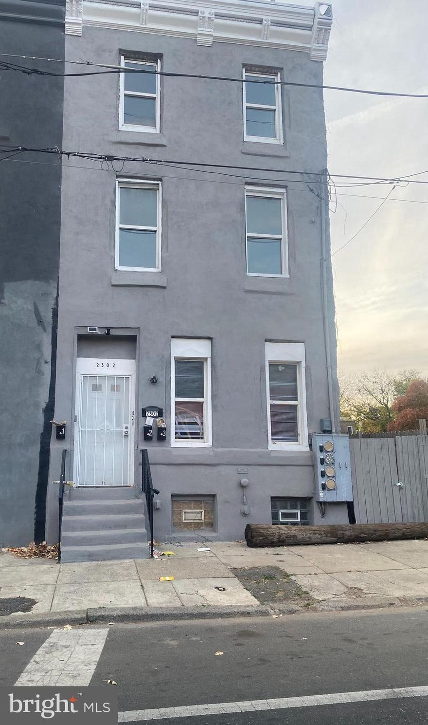 Turnkey, legal triplex in the rapidly growing Temple University area—an ideal opportunity for both investors and owner-occupants. This fully renovated 3-story row home features three spacious units, each offering 3 bedrooms and 1 full bathroom, perfectly suited for students, faculty, or young professionals. Each unit has been thoughtfully updated with modern finishes, including brand-new kitchens with white shaker cabinetry, stylish tile backsplash, and updated appliances. Bathrooms feature fully tiled tub/shower combos, complemented by updated flooring and recessed lighting throughout. The units are bright, airy, and offer generously sized bedrooms with ample closet space. Two units are currently occupied, generating $1,200 and $1,300 per month, providing immediate rental income. The third unit is vacant—perfect for an owner-occupant looking to offset their mortgage or an investor seeking to maximize rental potential. Additional highlights include separate utilities for each unit, making property management straightforward and efficient. Located just steps from Temple University, and within walking distance to shopping, restaurants, Broad Street, and multiple public transportation options, this property offers strong rental demand and long-term growth potential.