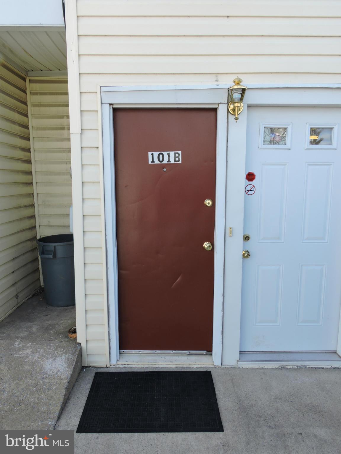 2 bedroom, 1 bath apartment in Ranson. Living room, separate dining room and kitchen with stove and refrigerator.