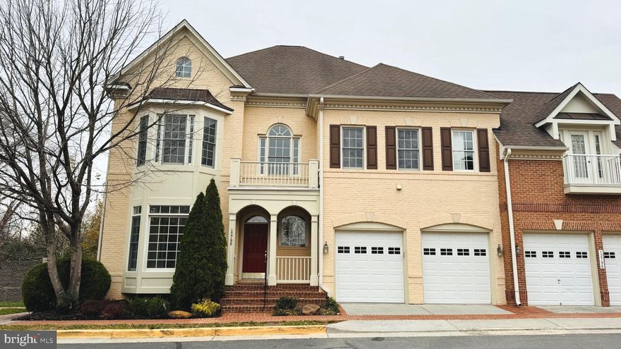 Step into ultra-luxury and unparalleled comfort with this Manor townhome in Kensington Square’s low-maintenance Rugby Road community. Built by premier builder WCI Renaissance, this exquisite “William Shakespeare” model features an all-brick exterior and timeless architectural detailing throughout. Meticulously cared for by its original owner, the home showcases gleaming hardwood floors, brand-new carpeting, new kitchen appliances (with the GE Monogram refrigerator still in excellent condition) and dual HVAC systems (one brand new and the other just three years new).
Set on a premium, private lot—one of only two duplexes constructed by WCI Renaissance—this property enjoys the rare convenience of two adjacent guest parking spaces. Walls of windows on three sides illuminate the home with natural light. With over 5,400 square feet of finished living space, this Manor home delivers the expansive feel of a detached residence with the ease of low-maintenance living.
The impressive entry begins with a dramatic two-story foyer featuring a soaring 16-foot ceiling and a wall of windows that flood the family room with sunlight. The chef’s kitchen offers extensive cabinetry, abundant counter space, and a center island with bar seating. It opens seamlessly to the large breakfast room and the two-story family room, both warmed by a double-sided gas fireplace. The formal living and dining rooms are accentuated by large bay windows, elegant columns, and striking crown moldings. A perfectly positioned home office sits between the family room and formal dining room, while a mudroom is conveniently located behind the garage.
Ascending the handsome stairwell, one notices the high-quality wrought-iron railings that add a refined touch to the home’s craftsmanship. The upper level features a luxurious primary suite with a tray ceiling, bay window, enormous sitting room with wet bar, overlook to the family room below, dual walk-in closets, and a spa-like bath with double vanities, a large soaking tub, and separate shower. Bedrooms two and three are equally generous, each offering its own full bath and spacious walk-in closet.
The lower level includes a large recreation room with a gas fireplace, an additional bedroom with a full bath, and a versatile den ideal for a fitness studio, hobby space, or media room.
Outside, enjoy a composite deck with brand-new flooring and a fenced rear yard with stone pavers. HOA amenities include a full basketball/sport court, two tot lots, walking paths, pocket parks, and gazebo picnic areas. The HOA also handles lawn care and leaf blowing—allowing you to enjoy a beautifully maintained property without the upkeep.
Ideally located just moments from Routes 286 and 50, this home provides easy access to Fair Oaks Hospital, Fair Oaks Mall, the public library, Fair Lakes, Fairfax Corner, and the International Country Club. Everyday conveniences such as Costco, Whole Foods, Harris Teeter, and Wegmans are all nearby. The highly sought-after Navy Elementary School—within Fairfax County Public Schools—is within walking distance.  This isn’t simply a home—it’s a refined lifestyle experience ready to be yours.