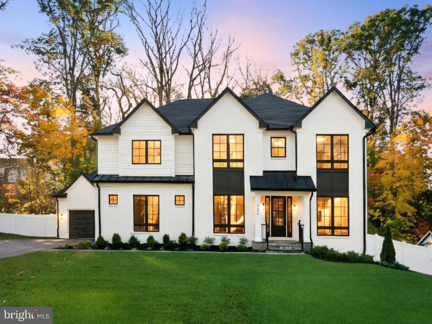 Discover this stunning 7-bedroom, 6.5+ bath new construction home by Tilden Signatures JMB, LLC, offering over 6,700 sq. ft. of luxury on a private, nearly half-acre lot.

The main level features 10-foot ceilings, wide-plank hardwood floors, and a dramatic open layout. A gourmet kitchen serves as the centerpiece, featuring professional-grade appliances, a massive waterfall island, and two-tone custom cabinetry. This space flows seamlessly into a light-filled great room anchored by a modern linear fireplace with a stone surround. A highly desirable main-level bedroom with a full bath provides perfect guest or in-law accommodation.

Upstairs, the expansive primary suite is a true retreat with two large walk-in closets and a spa-like bath featuring a freestanding tub and an oversized glass shower. Four additional bedrooms and a laundry room complete this level.

The bright, lower level is an entertainer's dream, complete with a large recreation room, a stylish wet bar, and a 7th bedroom/guest suite. This home is complete with a 3-car garage and a private, tree-lined backyard.