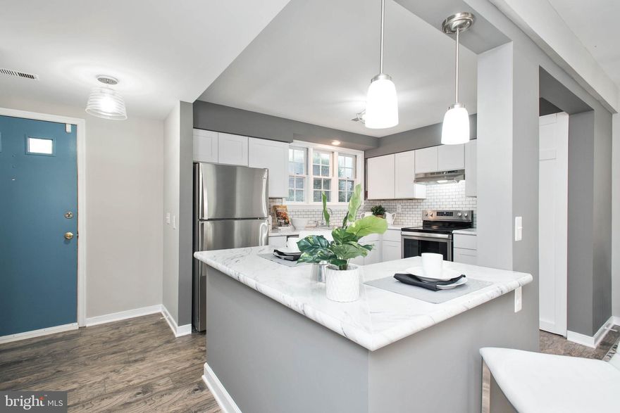 *Contact Stacey for more details ...703-850-6167* This is your incredible opportunity to own a completely renovated 2 bedroom home in the heart of downtown Warrenton under $200,000. It's designer upgrades features a brand new kitchen with white shaker style cabinets, mosaic tile back splash, and new Whirlpool stainless steel appliances.  Enjoy the custom breakfast bar with pendant lights that directly opens to dining room and living room for a perfect open-concept layout.  Modern light fixtures throughout, custom paint and hand scraped hickory laminate wood flooring just installed. Full bathroom features a 60 inch double sink vanity with marble top,  gorgeous 12x24 glazed ceramic floor tile and new fixtures. Brand new sliding glass door opens to large patio space overlooking green grass and common area. New HVAC Feb 2019. One assigned parking space + visitor parking. OPEN HOUSE SUNDAY AUGUST 4th from 12:00-2:00pm.