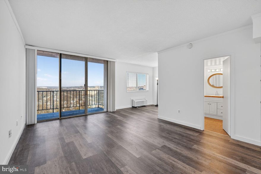 Welcome to this bright, move-in-ready studio condo on the 16th floor of Hunting Creek Club. This light-filled residence features an open, efficient layout with updated kitchen and bath, new flooring, and oversized windows that showcase sweeping views from above the treetops. A private balcony provides the perfect spot to relax and enjoy views of the community pool and tennis courts. With approximately 550 square feet, the space is thoughtfully designed for comfortable everyday living, whether you’re a first-time buyer, commuter, or investor. Hunting Creek Club offers a full-service lifestyle with controlled access, concierge service, outdoor pool, tennis courts, on-site parking, and laundry on every floor.  Ideally located just minutes from the Huntington Metro, Old Town Alexandria, major commuter routes, and neighborhood shopping and dining, this home delivers exceptional convenience at an approachable price point.