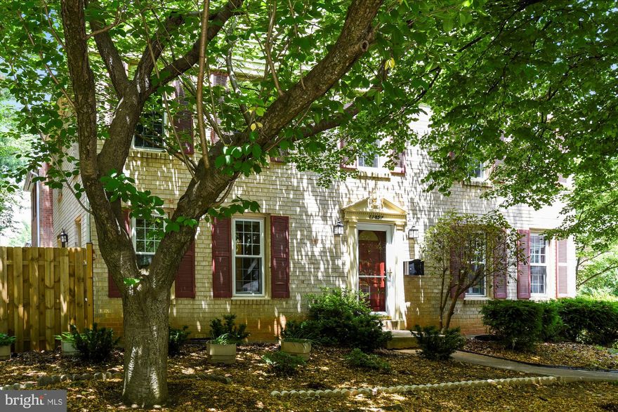 OPEN HOUSE CANCELLED DUE TO CONTRACT.  End Unit Townhomes like this don't come available often! Solid All Brick construction with FOUR bedrooms upstairs, two and a half UPDATED baths, and an UPDATED WHITE KITCHEN too!!!  NEW WOOD FLOORING AND CARPET and fresh paint were added to a home that already had replacement windows, a recently installed Gas HVAC system and water heater, newer white kitchen appliances and more!   Some nice added touches include cleaned air ducts, new light fixtures and various door and vent hardware.  Did you see the treed views out the windows?  Very calming setting!  DON'T MISS ALL THE OPEN PARKING SPACES RIGHT OUT FRONT!  Notice also that Deepwood is not part of Reston Association!  It has a better pool and lower fees!!! Last but not least, there's abundant open parking right in front!!!  No parking worries here!  Better come on over soon:)