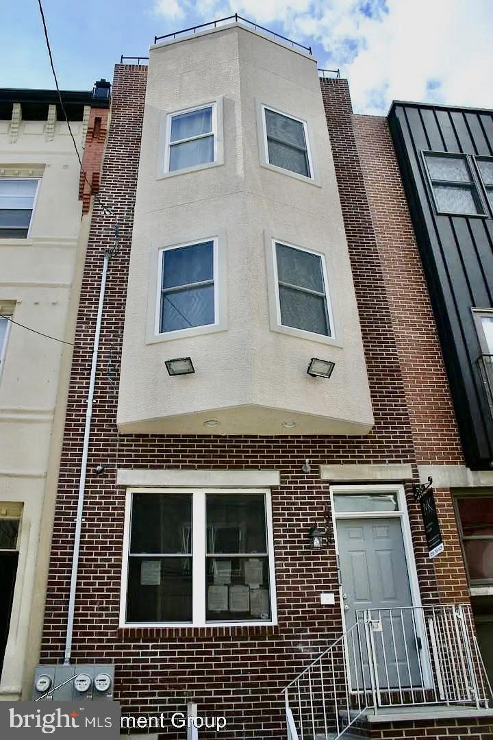 Check out this modern duplex situated on one of the most student-populated blocks in Temple University’s off-campus housing. This high-demand rental property offers luxurious living with premium amenities, including central air and heat, sleek hardwood flooring, natural stone kitchen counters, and in-unit laundry. Tenants enjoy easy access to key student destinations like Geasy Field, Polett Walk, and The Liacouras Center while being in the heart of Temple’s thriving off-campus community. Unit A is a 4-bedroom, 2-bathroom apartment featuring an expansive first-floor living area that flows seamlessly into a contemporary kitchen with an island and stainless steel appliances. Unit B is a 5-bedroom, 4-bathroom apartment with spacious layouts and custom closet shelving designed for student comfort. This unit also boasts high-end entertainment features, including a flat-screen TV with surround sound, outdoor speakers with aux hookups, and a large fiberglass rooftop deck with a stunning view of the Philadelphia skyline. The gross annual income for the 2025-2026 school year is $67,800 with estimated expenses at $19,191. With an estimated net operating income of $48,608 and offered at a 7.31% cap rate, this building is a cash flow machine and will be a great addition to any investor's portfolio! With a strong rental history, this duplex presents an excellent investment opportunity in one of the most sought-after student rental locations. Don’t miss out on adding this high-performing property to your portfolio!